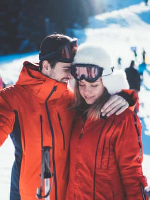 Couple at ski resort for the Christmas holidays
