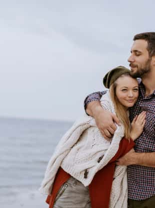 Photo of a lovely couple on the beach