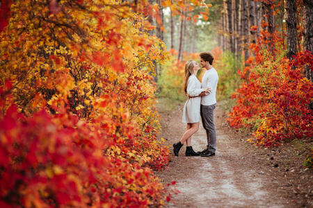 autumn love, couple kissing in fall park, happy man and woman outside