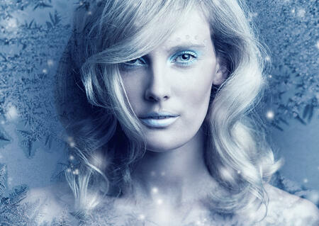Conceptual shot of a beautiful young woman frozen in ice