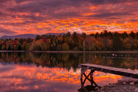Sunrise after overnight storm in Fall at Waterbury Center State Park, Vermont, USA