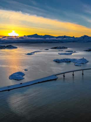 Spectacular Norwegian natural landscape Sommaroy Island aerial view amazing sunset Scandinavian arctic condition Northern Norway Europe