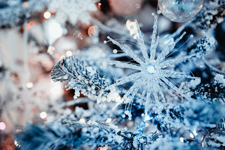 Snowflake. New Year's Snowflake xmas. Decorated Christmas tree