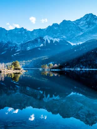 famous eibsee lake in front of zugspitze mountain in germany