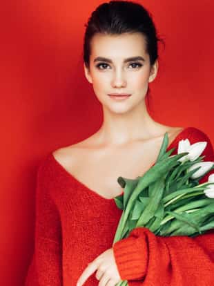 Beautiful woman holding bouquet