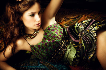 beautiful brunette woman in oriental style clothes, studio shot