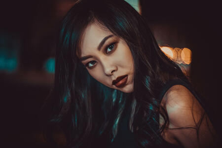 Night portrait of young asian woman