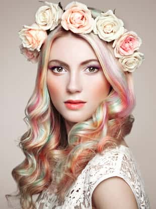 Beauty Fashion Model Girl with Colorful Dyed Hair. Girl with perfect Makeup and Hairstyle. Model with perfect Healthy Dyed Hair. Rainbow Hairstyles. Floral Wreath