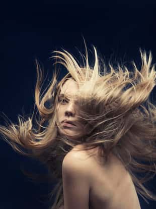 young beautiful women with flying hair