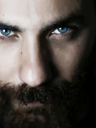 ?stanbul, Turkey - February 23. 2017:close up face, blue eyes, strong man, bearded man