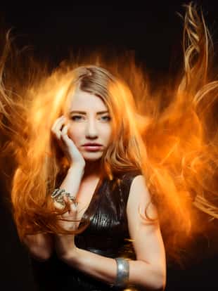 fashion woman with hair in fire, glam shoot.