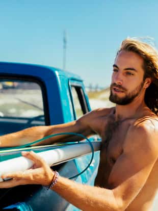Close up of a surfer getting ready