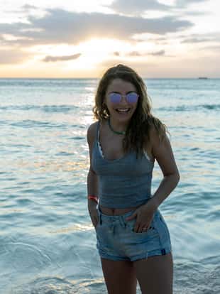 beautiful woman in sunglasses on the beach
