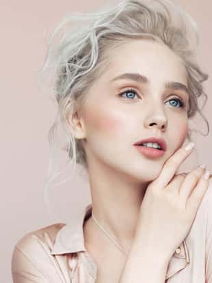 Beautiful woman with make-up and stylish hairstyle