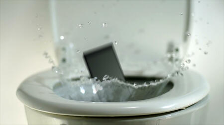 Mobile phone thrown into the toilet